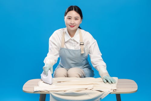 藍底熨衣服保潔服務女性人物攝影圖 攝影